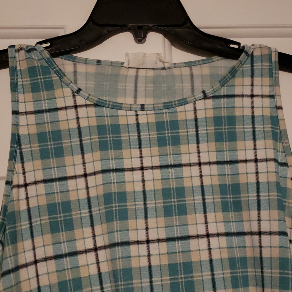 Boutique Sleeveless pocket tunic